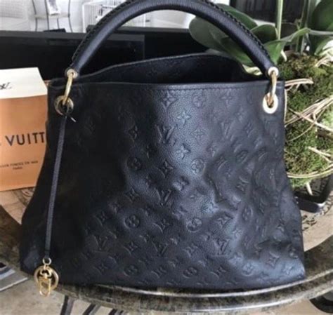 louis vuitton black handbag gold zip|authentic Louis Vuitton handbag black.